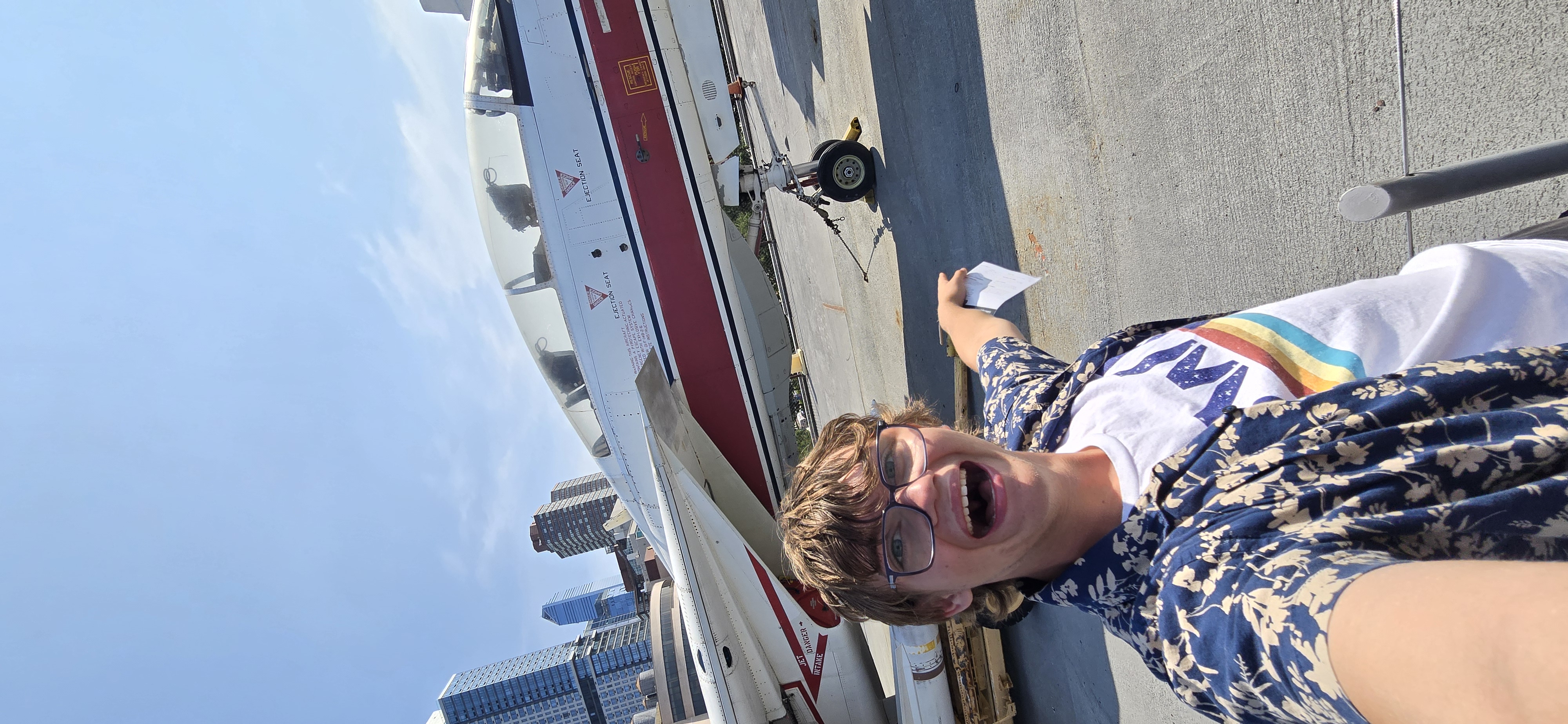 image of myself next to a plane